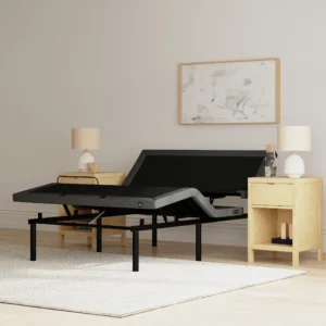 Minimalist bedroom scene featuring an inclined adjustable base between light-wood nightstands.