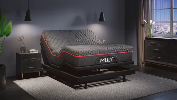 Adjustable-base bed lifting a black MLILY mattress with red trim in a moody modern bedroom.